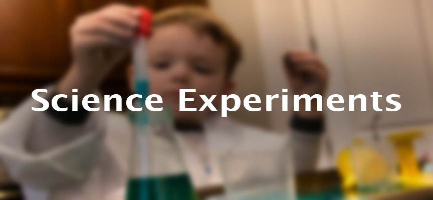 Child wearing lab coat doing science experiment